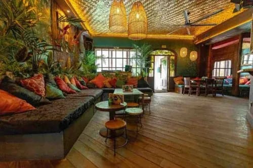Tropical Sanctuary With Bamboo Ceiling & Rattan Lighting for Exotic Events