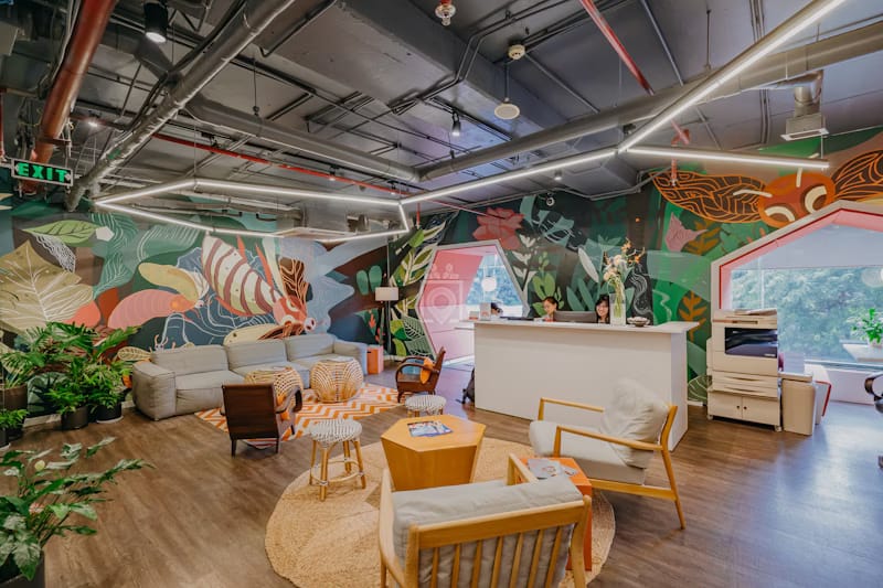 Creative Lounge With Murals and Arched Windows for Workshops