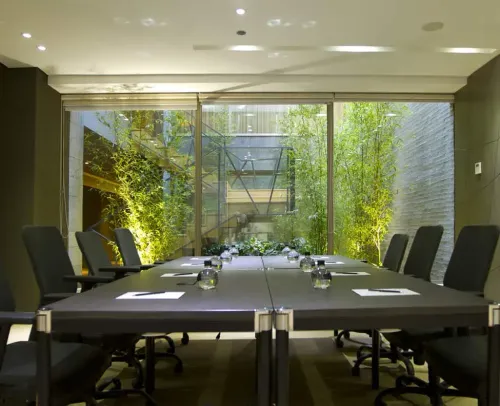Contemporary Boardroom With a Green Touch for Sophisticated Meetings