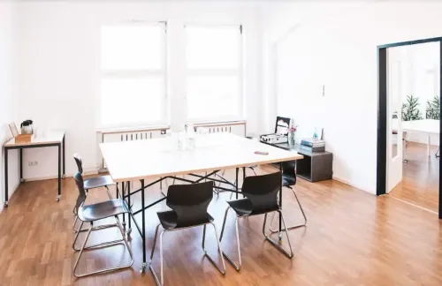 Minimalist Meeting Hub With Ample Sunshine for Intimate Corporate Gatherings