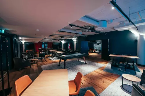 Sophisticated Industrial Lounge With a Cosy Atmosphere for Intimate Networking