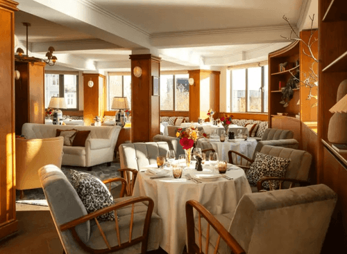 Mid-Century Waterfront Lounge With Danish Flair for Intimate Corporate Encounters