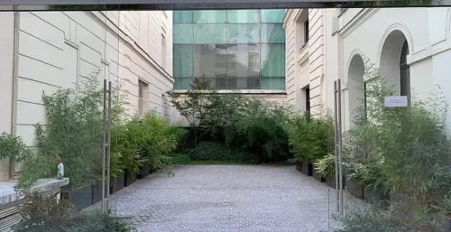 Bright & Minimalistic Showroom With Lush Green Patio for Diverse Events