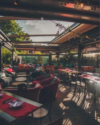 Open Rooftop Terrace With Rustic-Boho Style for Casual Meetings and Post-work Gatherings