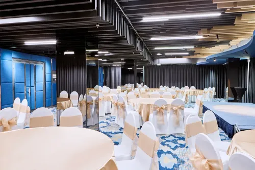 Blue-Accented Geometric Conference Room for Workshops and Seminars
