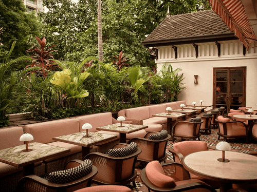 Terracotta-Toned Dining Floor with Indoor–Outdoor Seating