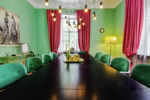 Vibrant Emerald Boardroom for Exclusive Meetings and Thoughtful Discussions