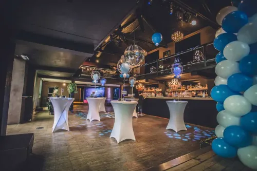 Stylish Two-Level Venue With Atmospheric Lighting for High-Energy Social Events