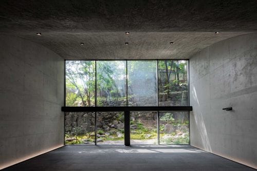 Industrial Chic Venue With Raw Concrete Steel Beams Perfect for Dinners and Pop-Up Events