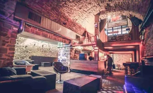 Historic Stone Vault Transformed for Vibrant Corporate Gatherings