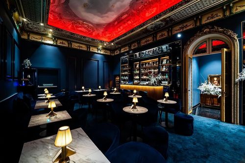 Sophisticated Jazz Lounge With Plush Seating and Statement Lighting for Exclusive Client Nights. Jass Lounge