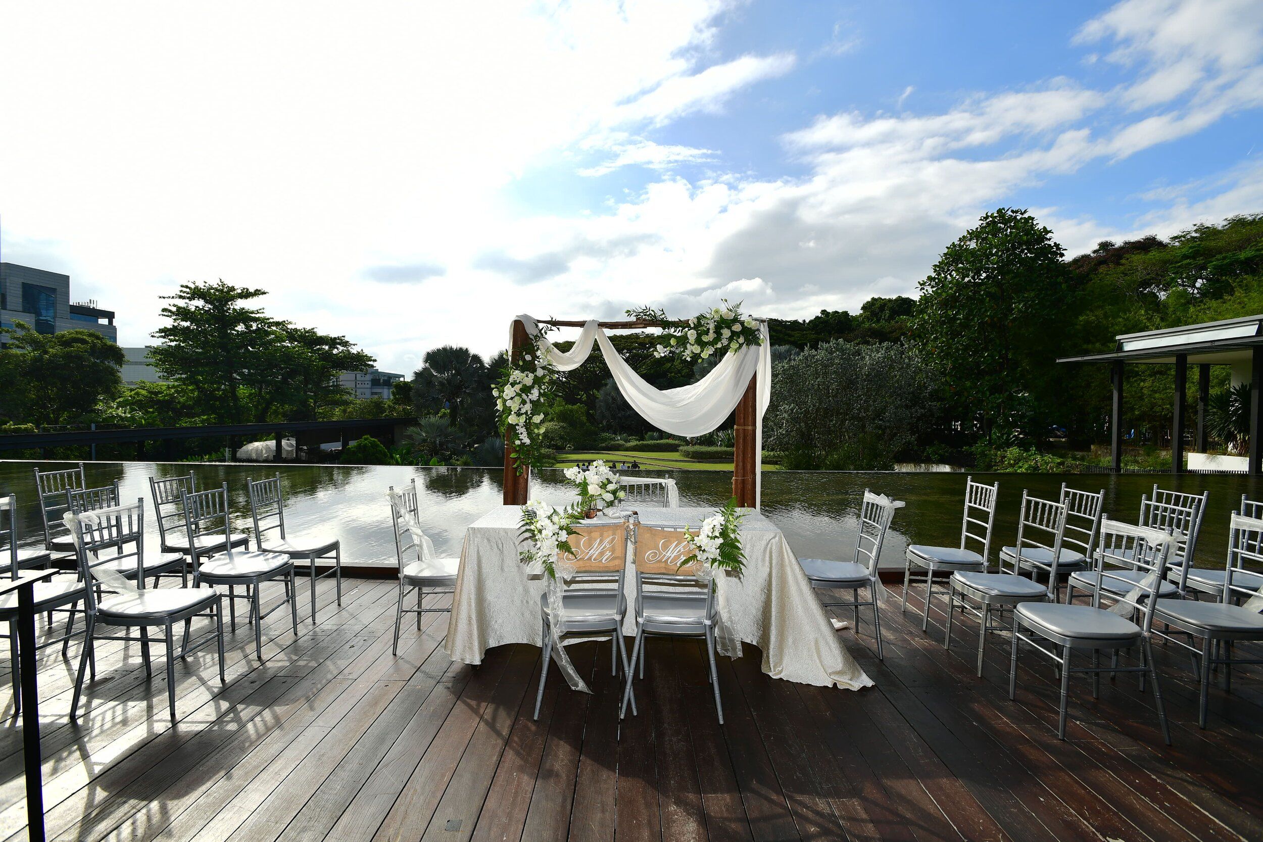 Rustic Timber Deck With Infinity Pool and Garden Backdrop for ...