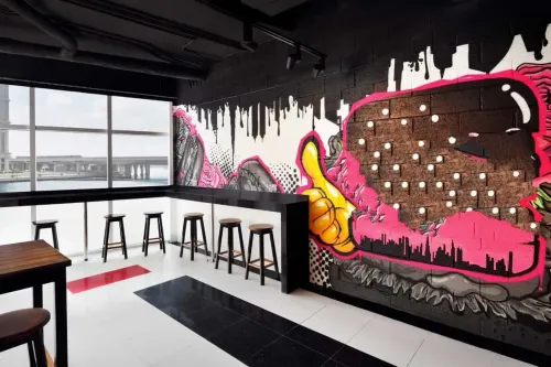 Chic Rooftop With Striking Graffiti Murals for Trendy Corporate Events. JW Marriott Marquis Hotel Dubai. Lush Burger