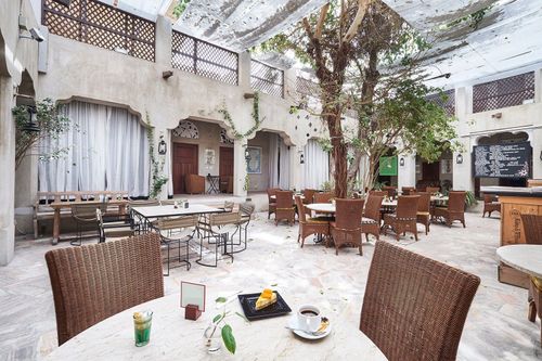 Rustic Courtyard With Serene Natural Ambience for Vibrant Mixers. XVA Gallery. Cafe