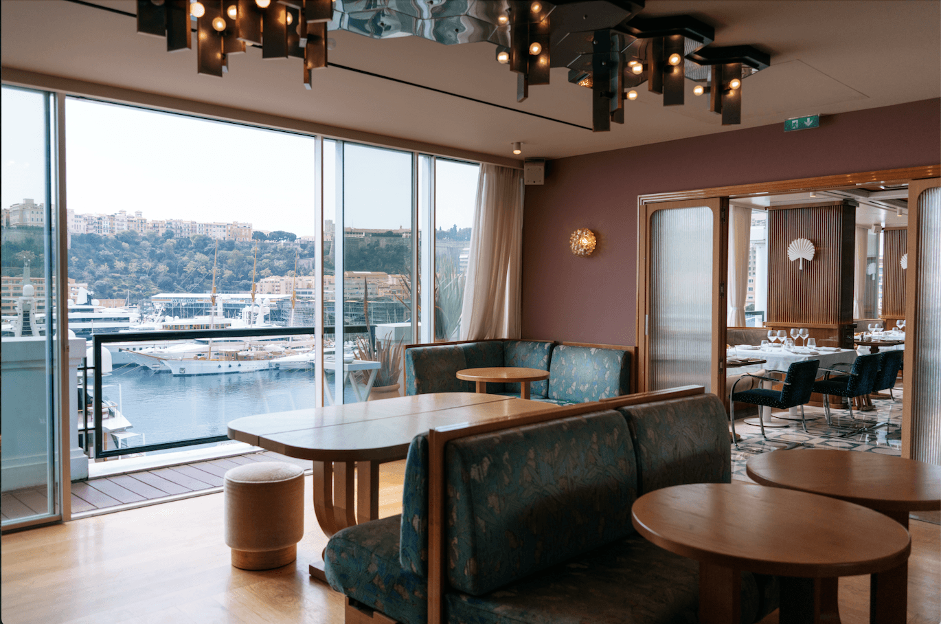 Monroe Rooftop Rooftop Room With Marina Views and Curved Wood for Private Dining in Monaco