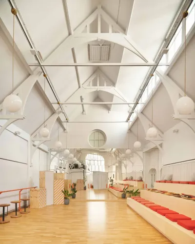 Vaulted White Chapel With Modular Seating for Bold Corporate Events. Spaces & Stories Aviation House. The Chapel