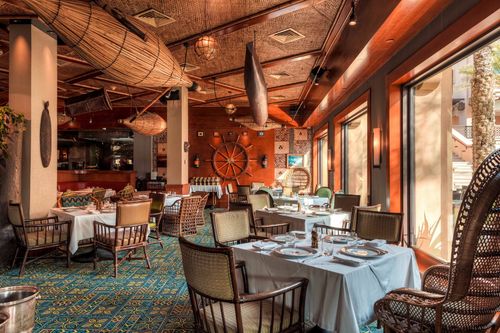 Tropical Island-Inspired Dining Space for Vibrant Corporate Dinners. Trader Vics Madinat