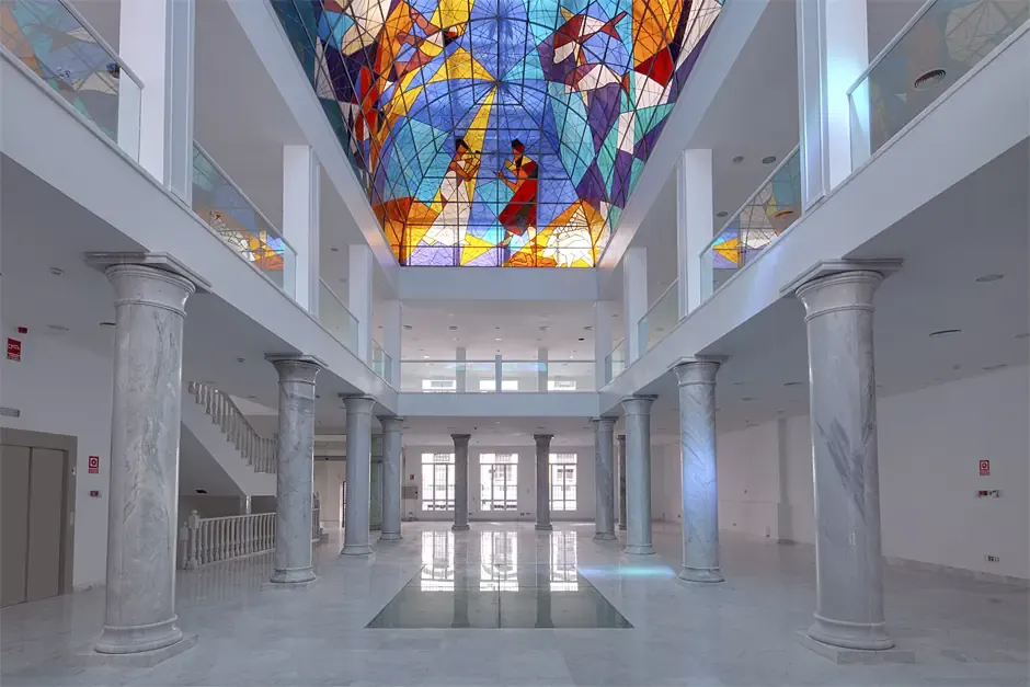 Modern Neoclassical Atrium With Marble Columns and Stained-Glass ...